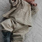Baby wearing Lalaby knitted Alpha shoes for babies in dove blue cashmere