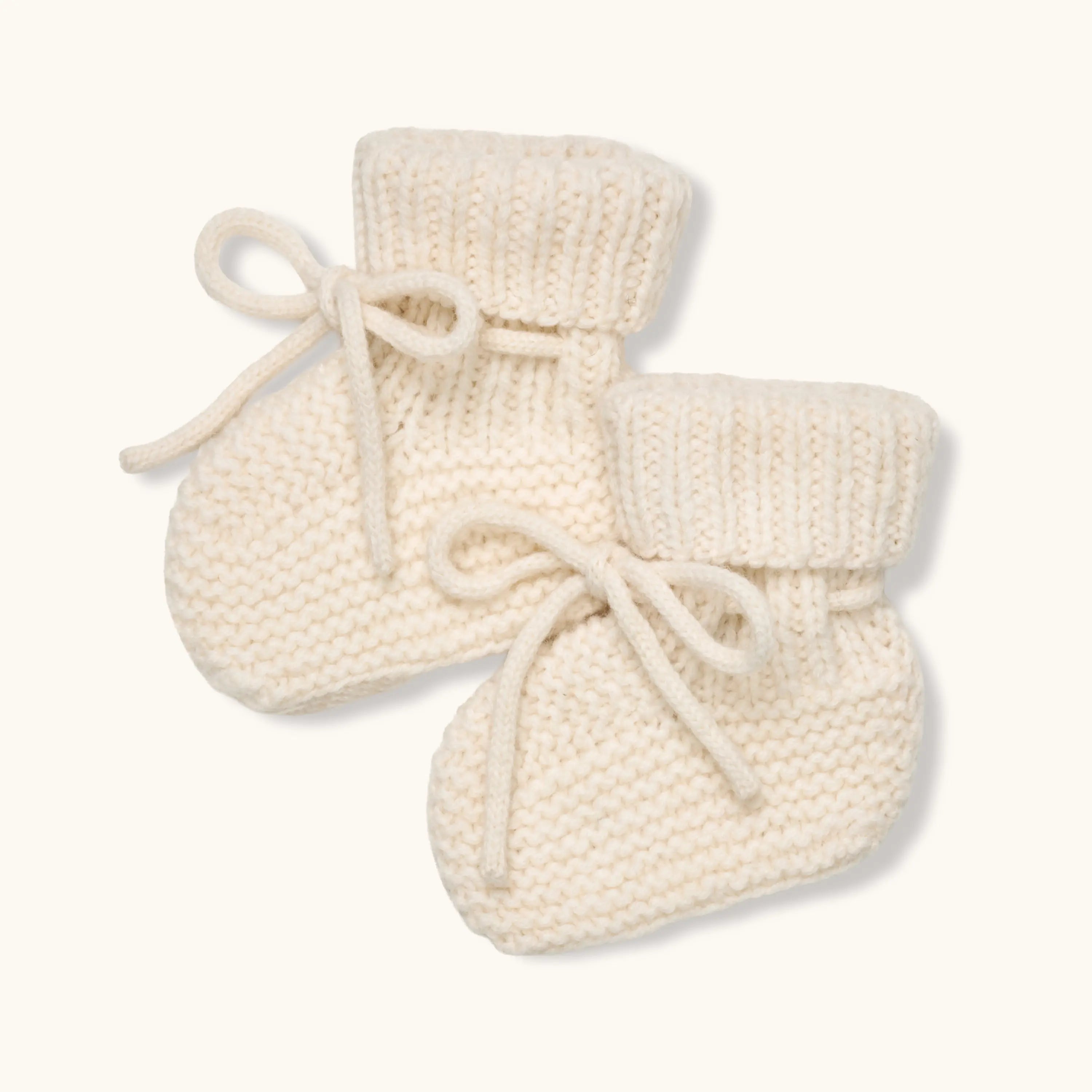 Lalaby knitted Alpha shoes for babies in natural white merino wool