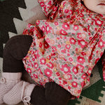 Baby wearing Lalaby Alpha shoes in powder pink cashmere