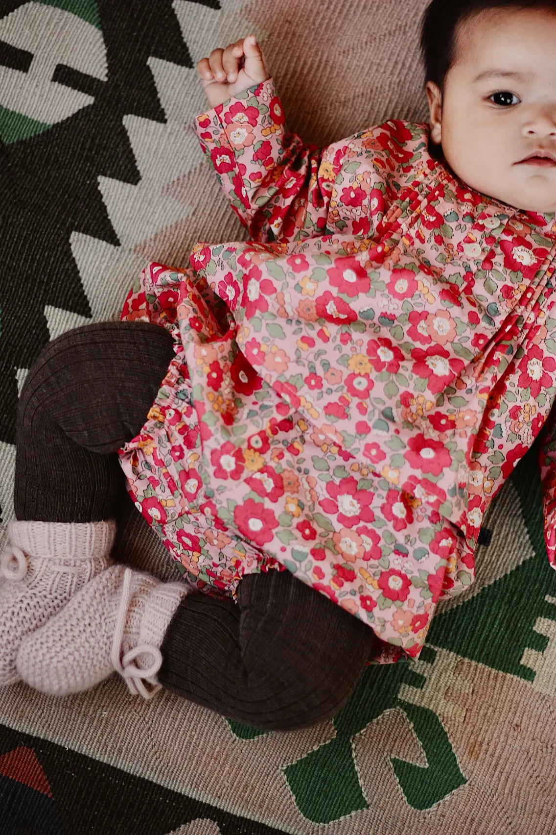 Baby wearing Lalaby Alpha shoes in powder pink cashmere