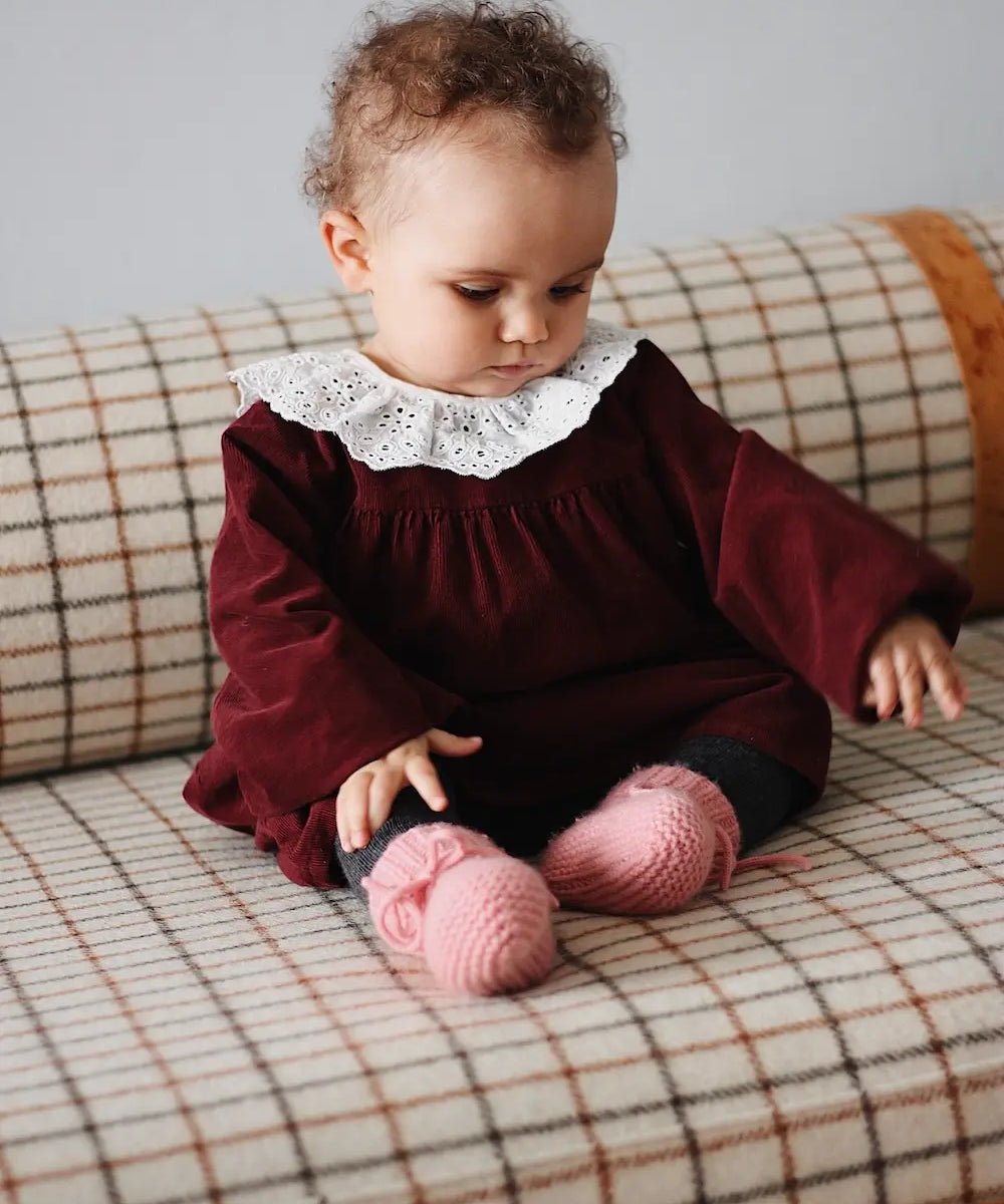 Baby girl wearing Lalaby Alpha shoes in sorbet pink cashmere