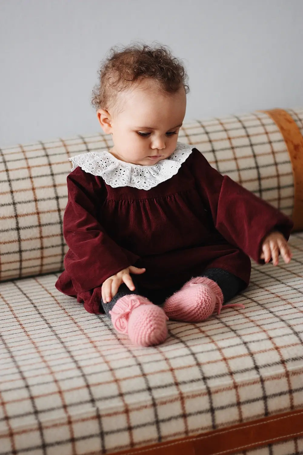 Baby girl wearing Lalaby Alpha shoes in sorbet pink cashmere