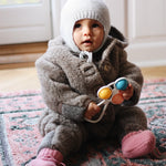 Baby girl wearing Lalaby Alpha shoes in sorbet pink cashmere