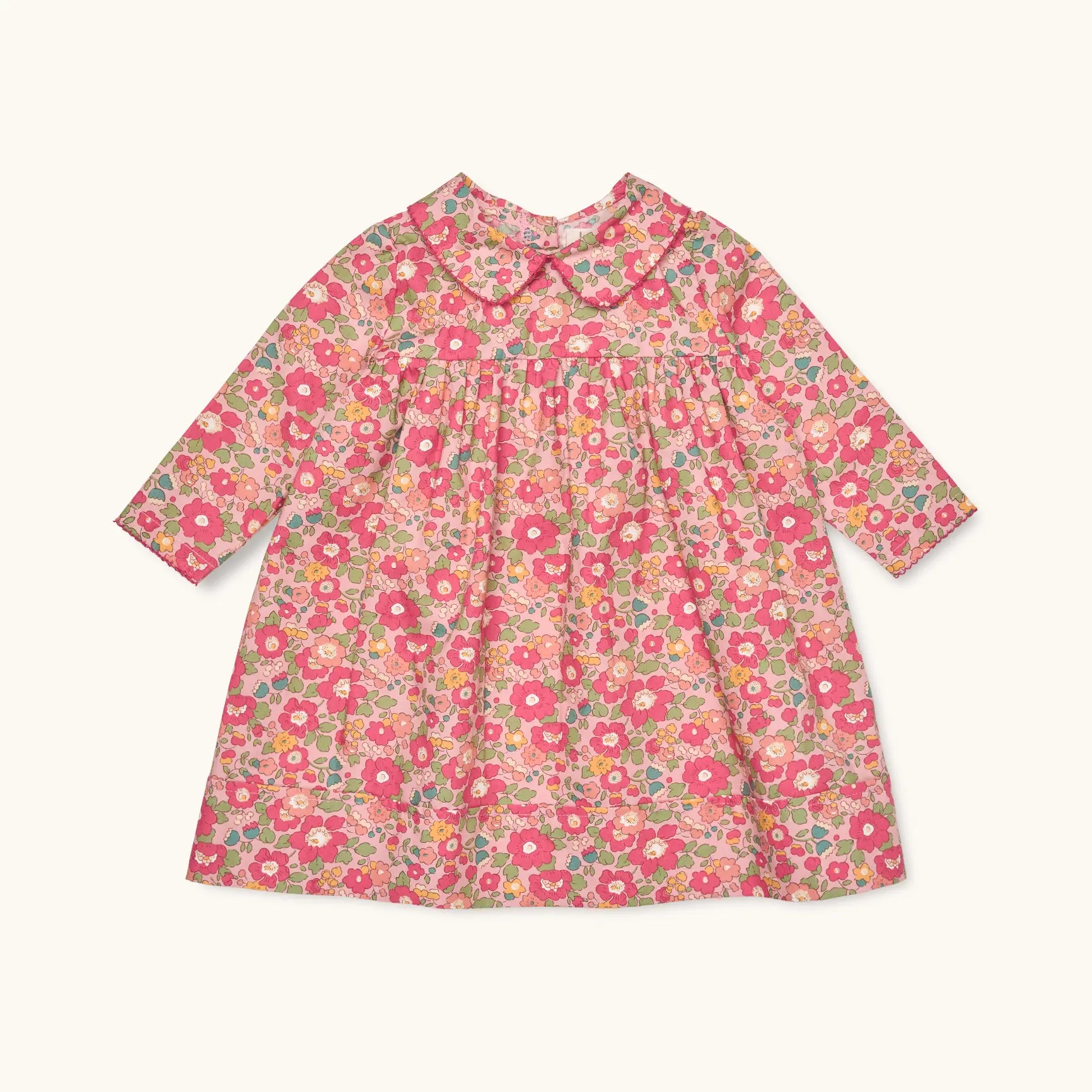 Lalaby Anna dress for babies in berry betsy pink liberty organic cotton