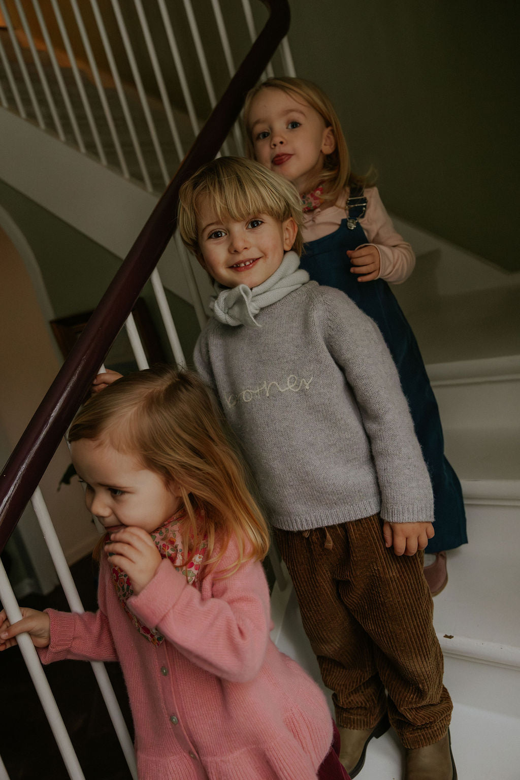 Boy wearing Lalaby Atlas scarf in bluey light blue cashmere