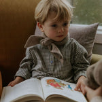 Boy wearing Lalaby Atlas scarf in toast brown cashmere
