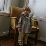 Boy wearing Lalaby Atlas scarf in toast brown cashmere