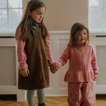 Girl wearing Lalaby Atlas scarf in storm grey cashmere 
