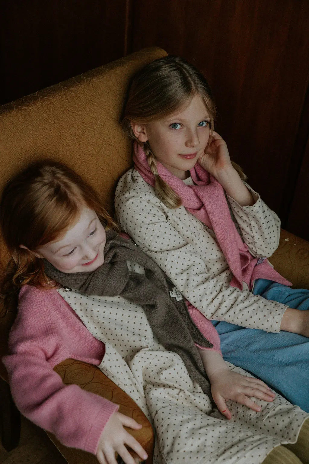 Girl wearing Lalaby Atlas scarf big in sorbet pink cashmere