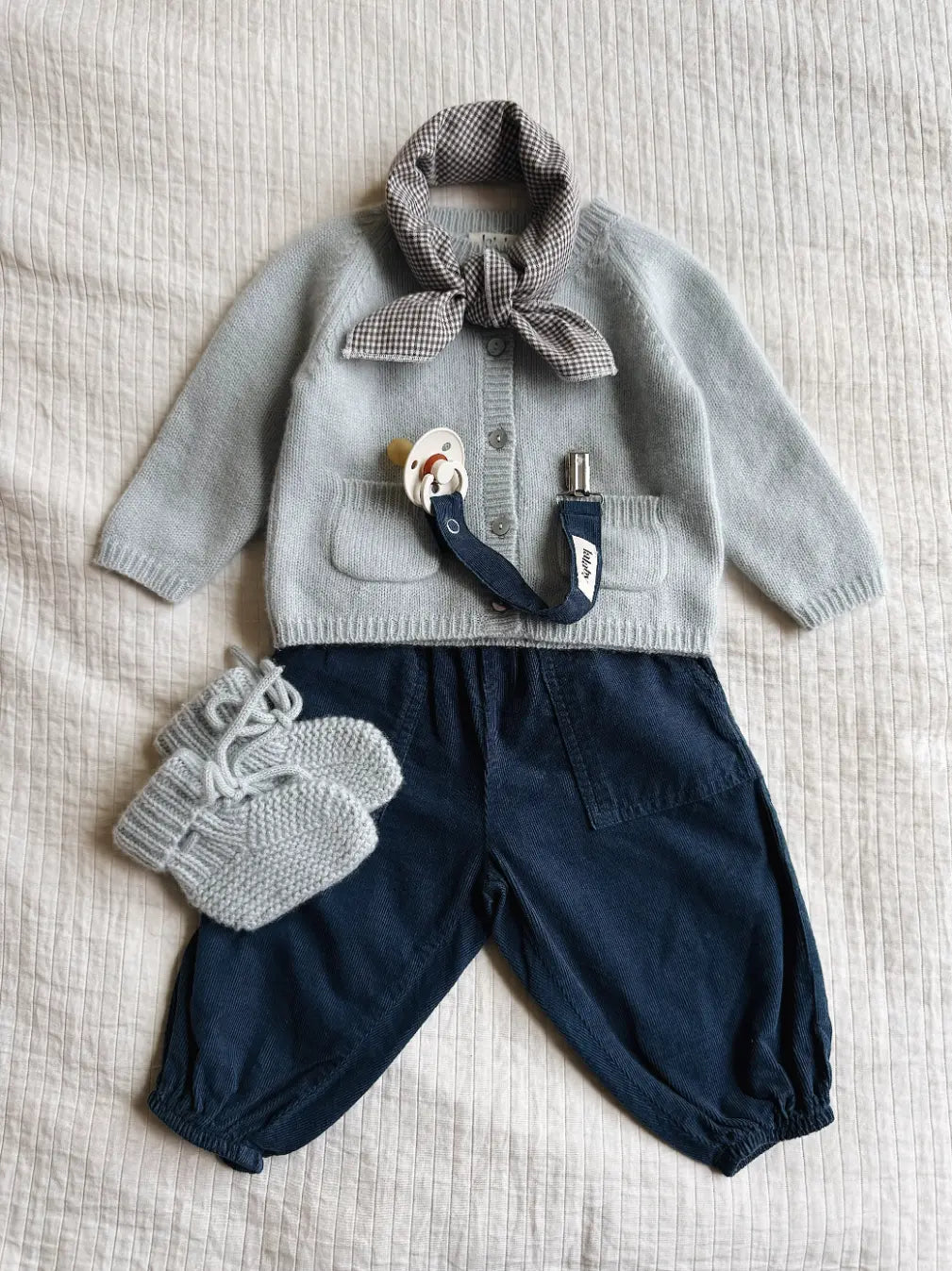 Lalaby AW26 baby boy look in shades of bluey, whale & tiny check brown