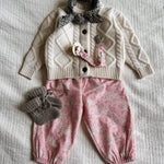 Lalaby AW26 baby girl look in shades of natural, pink flower cord, tweedy & millet