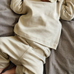 Baby boy wearing Lalaby Baloo set in 100% organic cotton interlock in the shade cloud