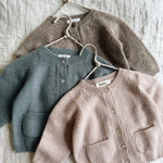Selection of Lalaby Bobbie cardigans for babies in powder pink, dove blue and toast brown cashmere