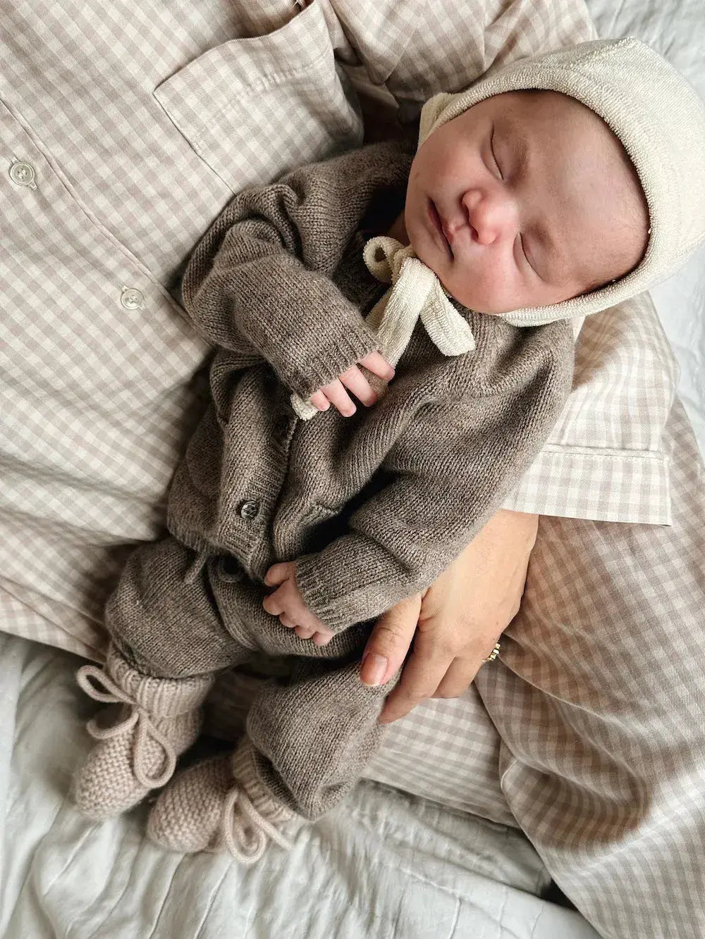 Baby wearing Lalaby Bobbie cardigan and Stormy pants in toast brown cashmere