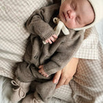 Baby wearing Lalaby Bobbie cardigan and Stormy pants in toast brown cashmere