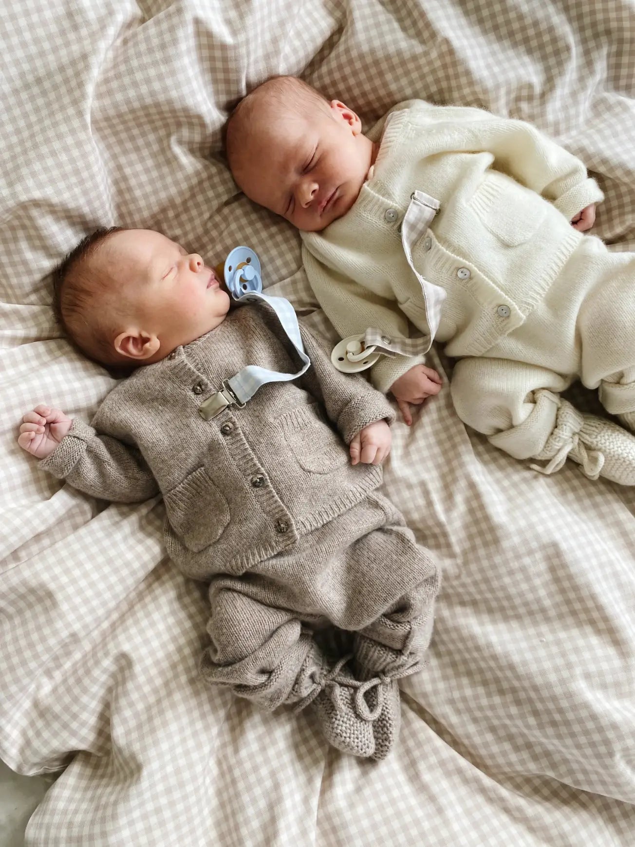 Baby wearing Lalaby knitted Alpha shoes, Bobbie cardigan and Stormy pants in toast brown cashmere