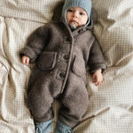 Baby wearing Lalaby knitted Bobo hat in dove blue cashmere