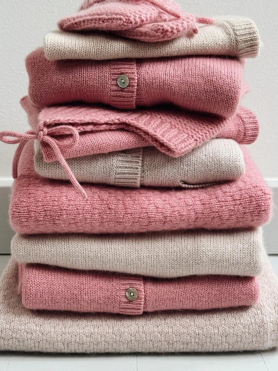 Lalaby baby and kids clothing in sorbet and powder pink cashmere