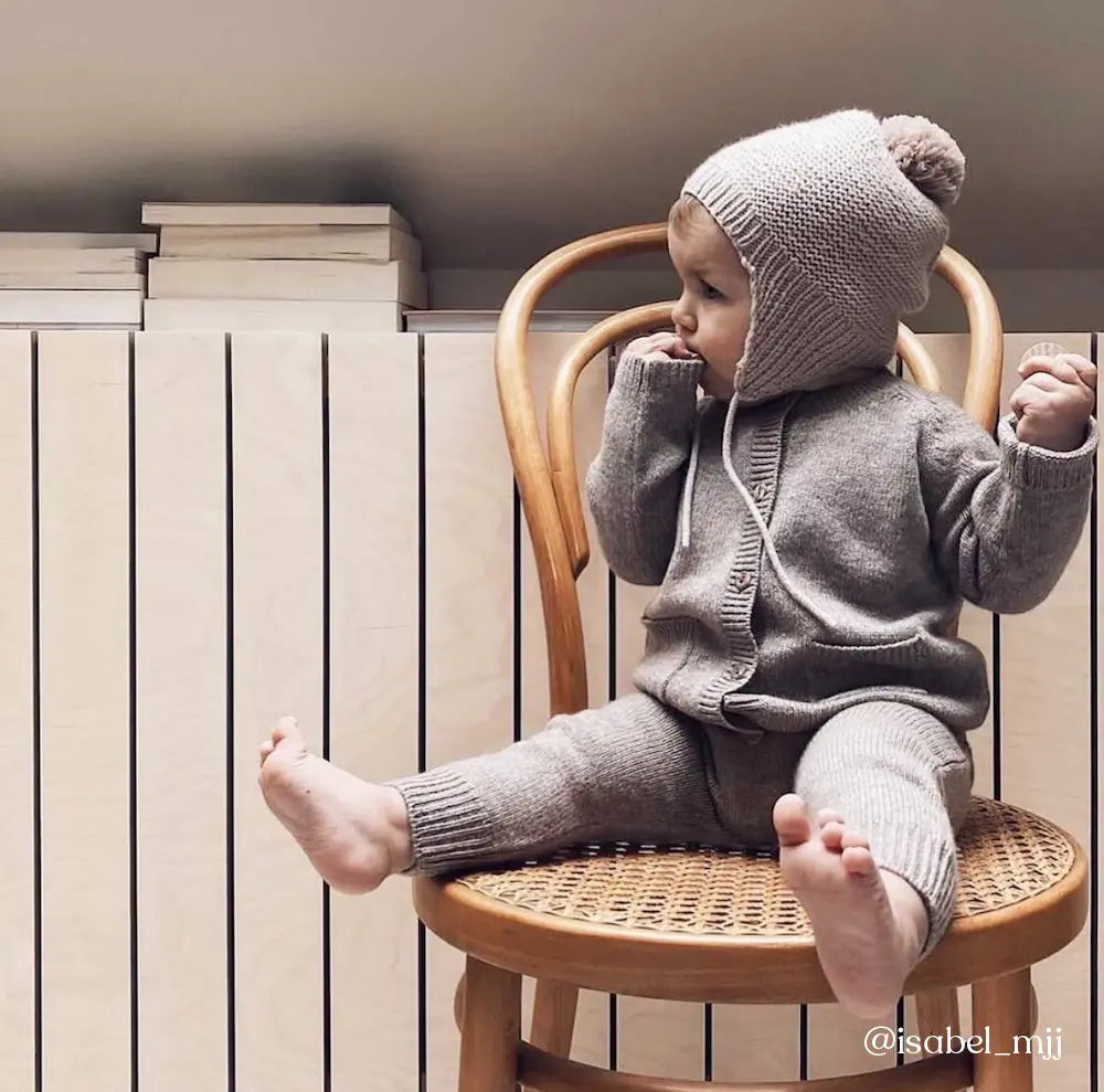 Baby wearing Lalaby knitted Bobo hat in toast brown cashmere