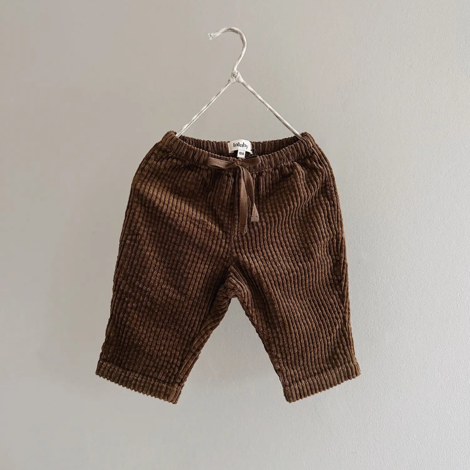 Lalaby Charlie trousers for babies in cookie brown organic cotton mega cord
