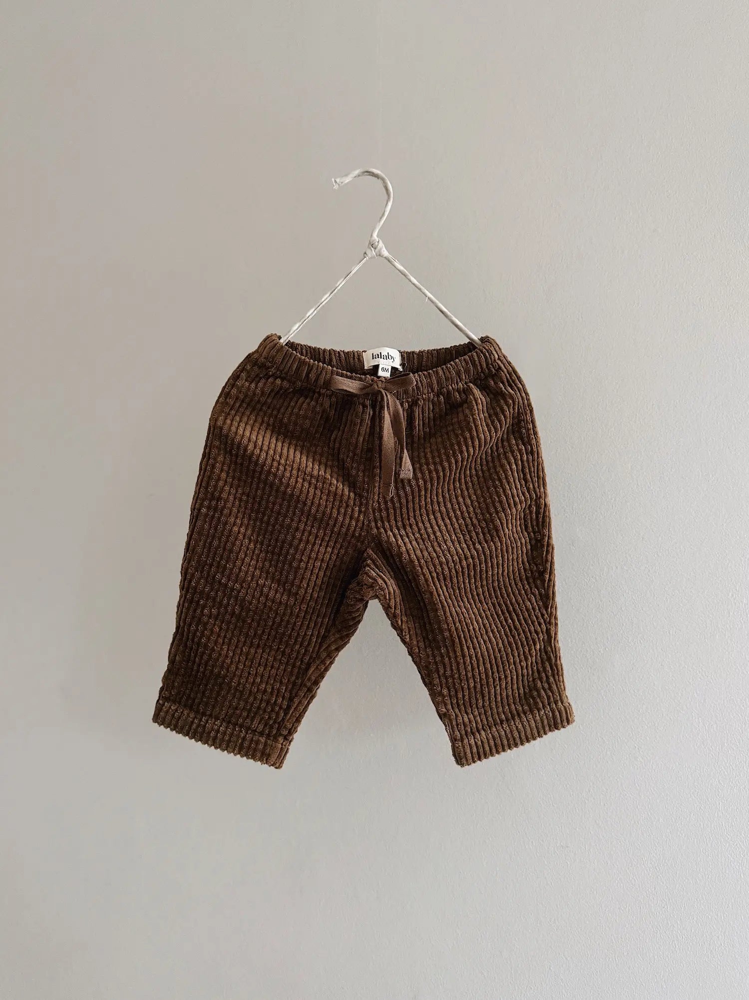 Lalaby Charlie trousers for babies in cookie brown organic cotton mega cord