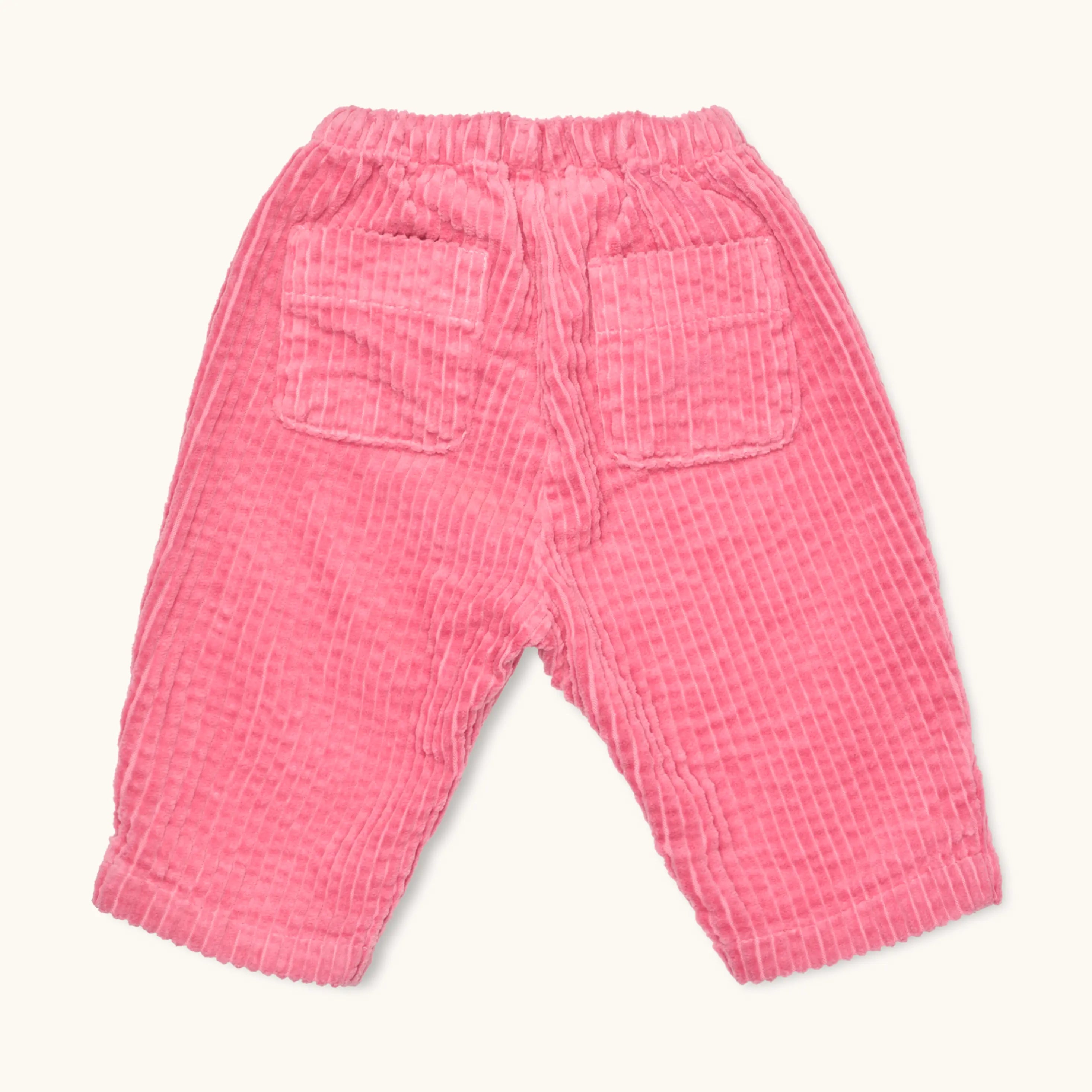 Lalaby Charlie trousers for babies in flamingo pink organic cotton mega cord