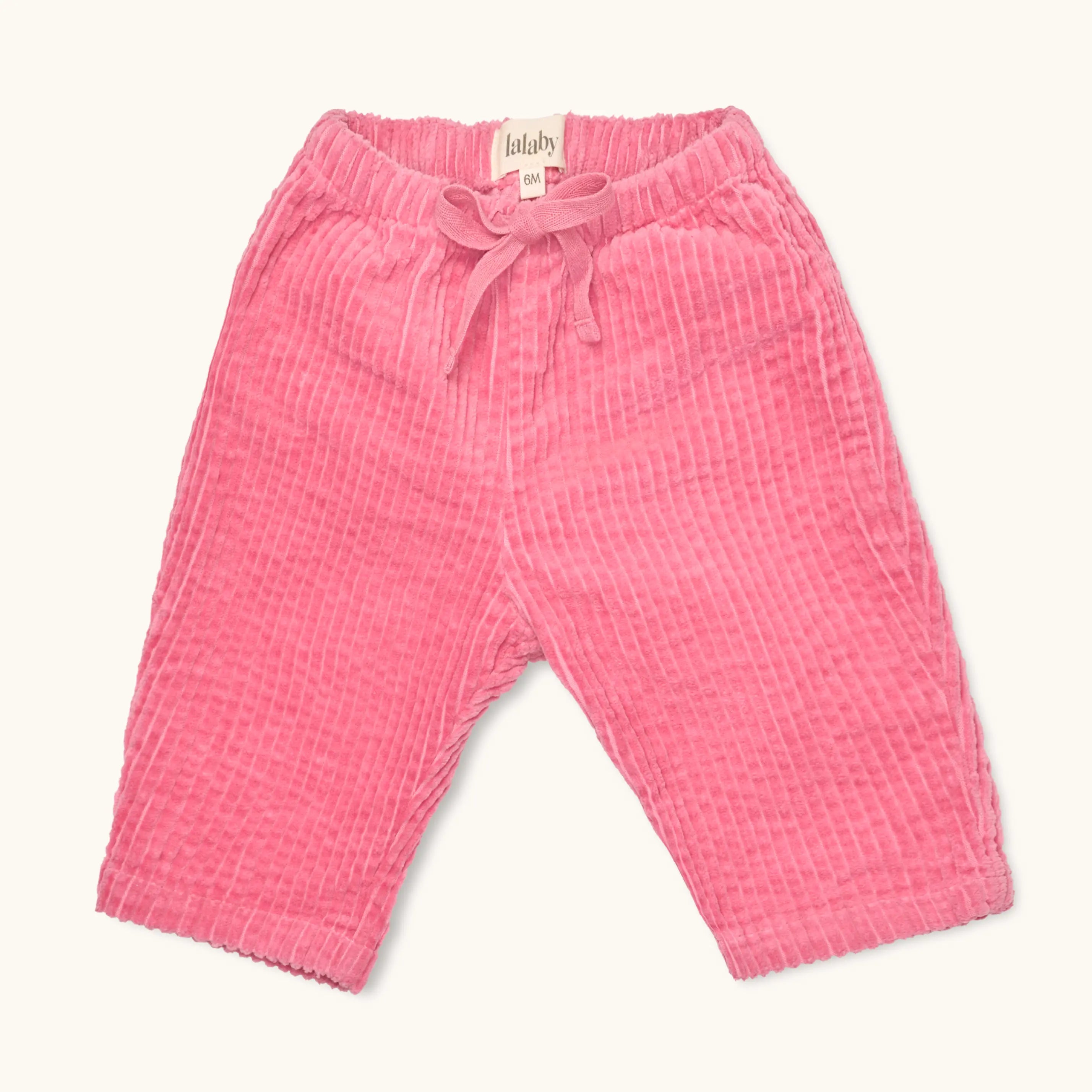 Lalaby Charlie trousers for babies in flamingo pink organic cotton mega cord