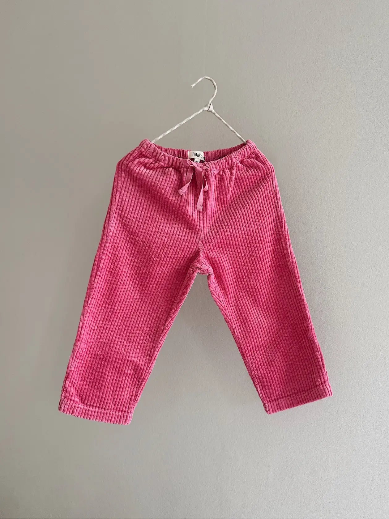 Lalaby Charlie trousers for kids in flamingo pink organic cotton mega cord