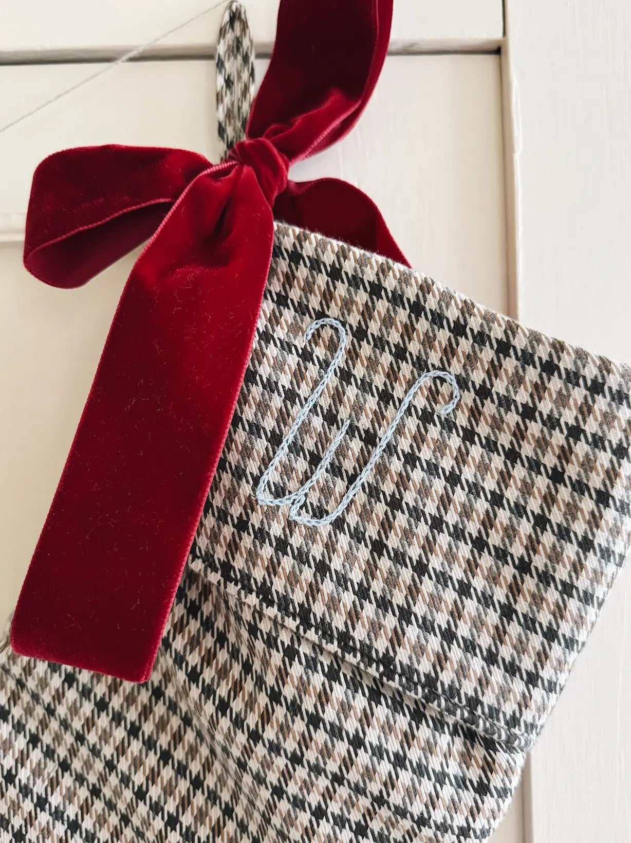 Lalaby Christmas stocking in tweedy check brown with blue hand embroidery