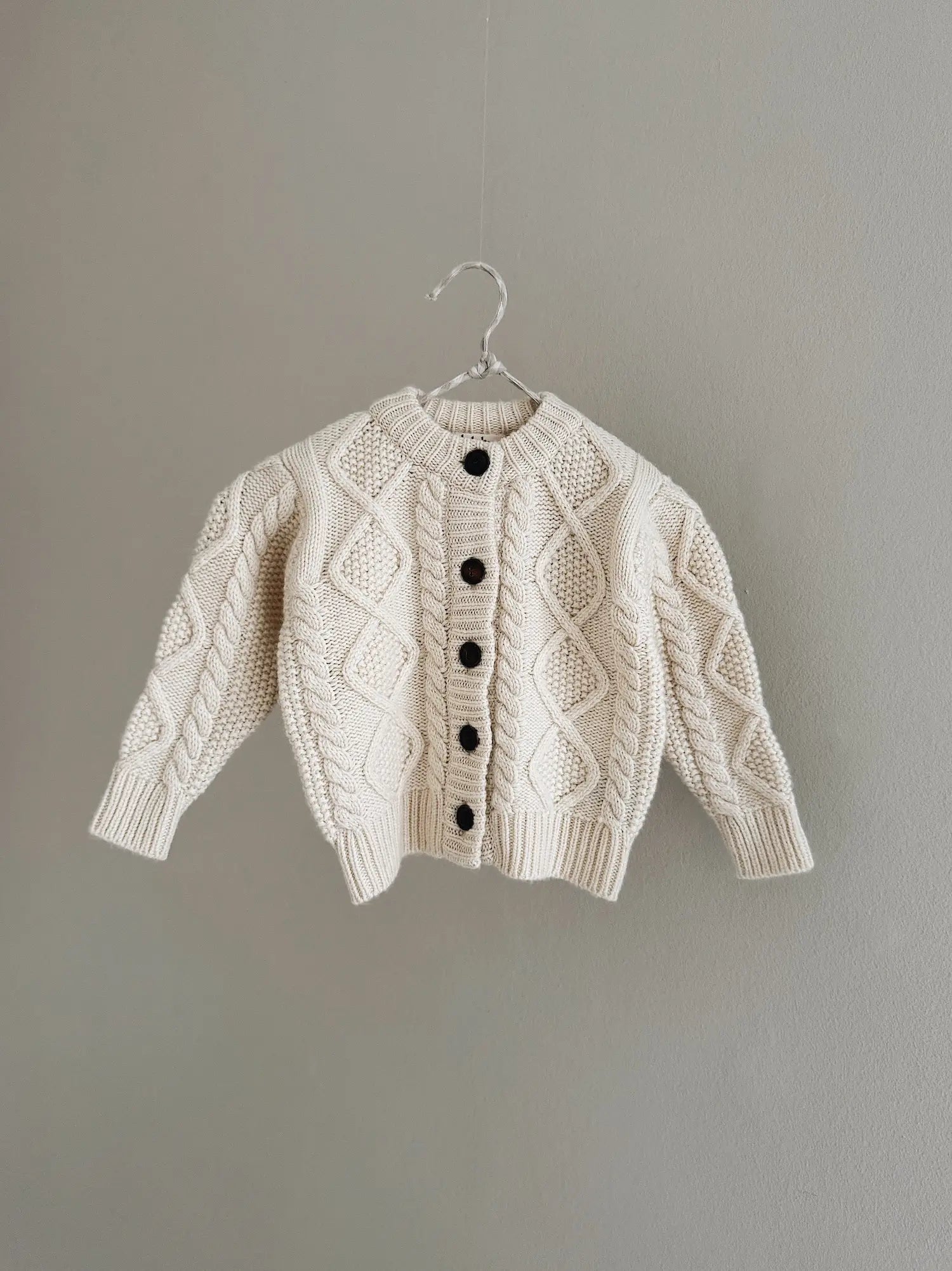 Lalaby Coby cardigan for babies in natural white merino wool