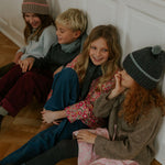 Boy wearing Lalaby Cole jumper in storm grey cashmere