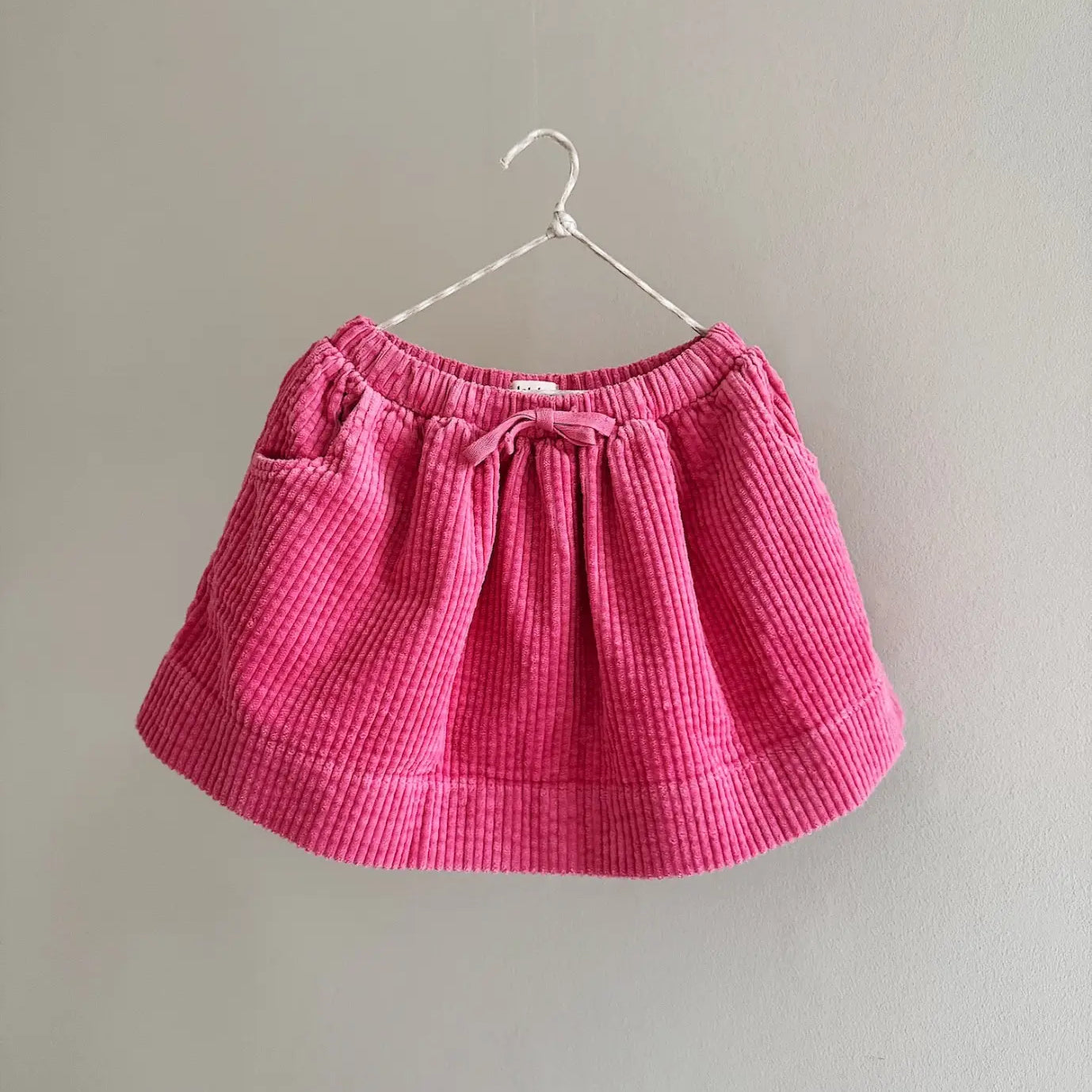 Lalaby Dagmar skirt for kids in flamingo pink organic cotton mega cord