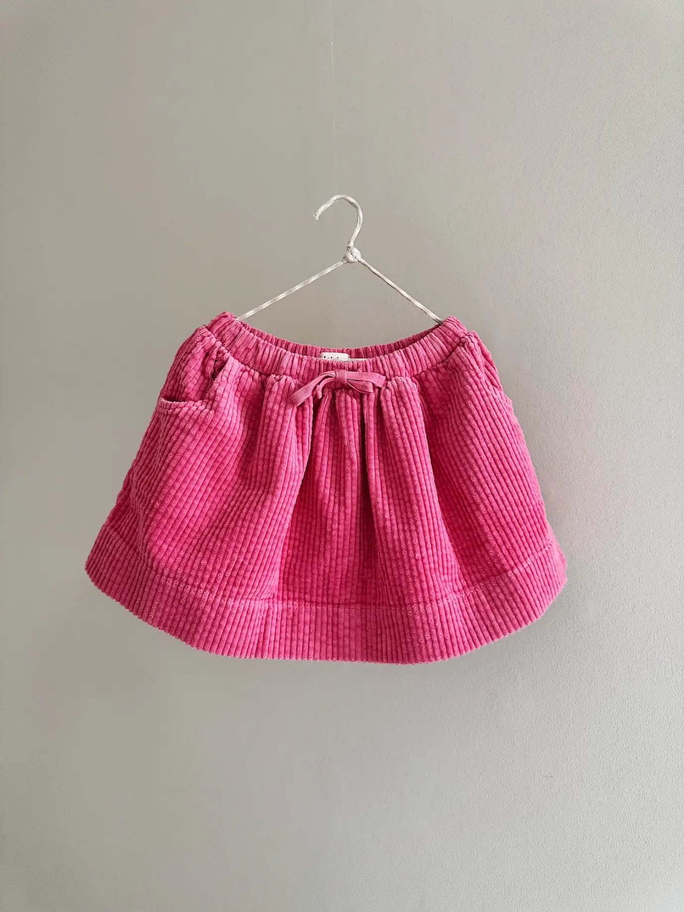 Lalaby Dagmar skirt for kids in flamingo pink organic cotton mega cord