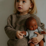 Girl wearing Lalaby ILY sweater for kids in millet brown baby wool, yak and cashmere blend