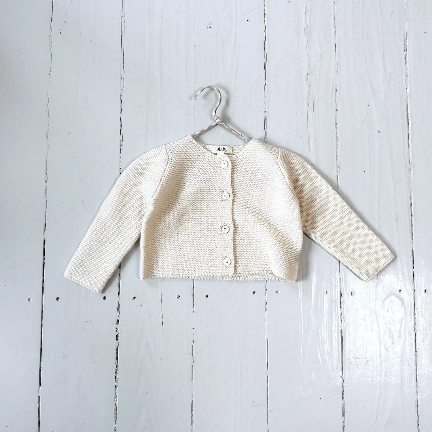 Lalaby Kuro cardigan for babies in natural white merino wool