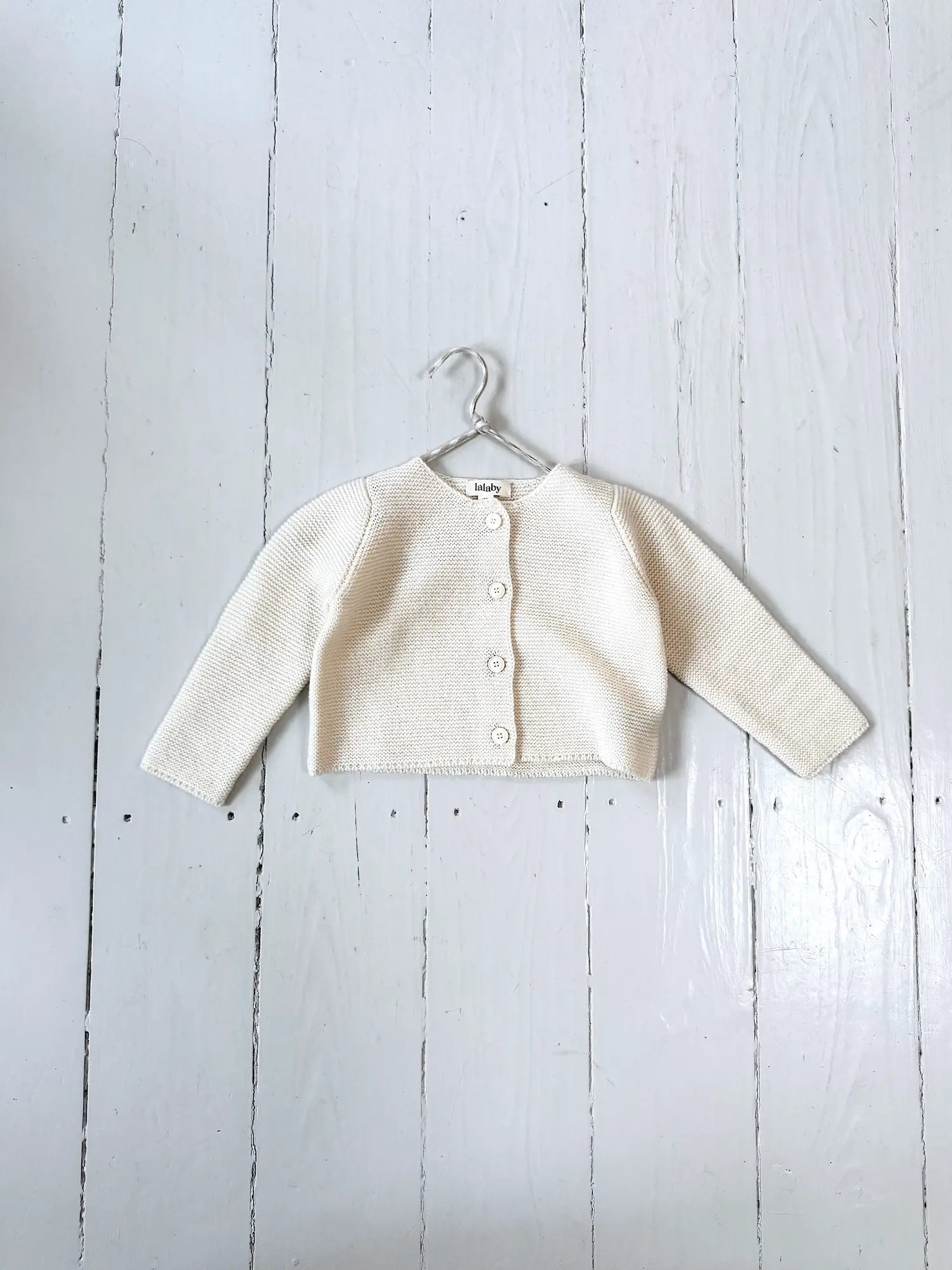 Lalaby Kuro cardigan for babies in natural white merino wool