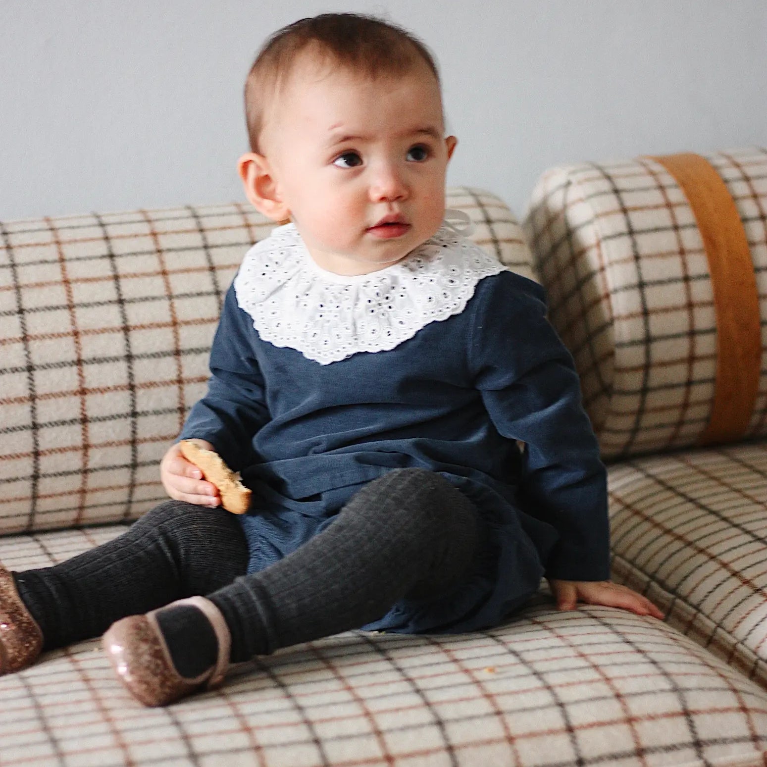 Baby girl wearing Lalaby Lucy set in whale blue cotton baby corduroy