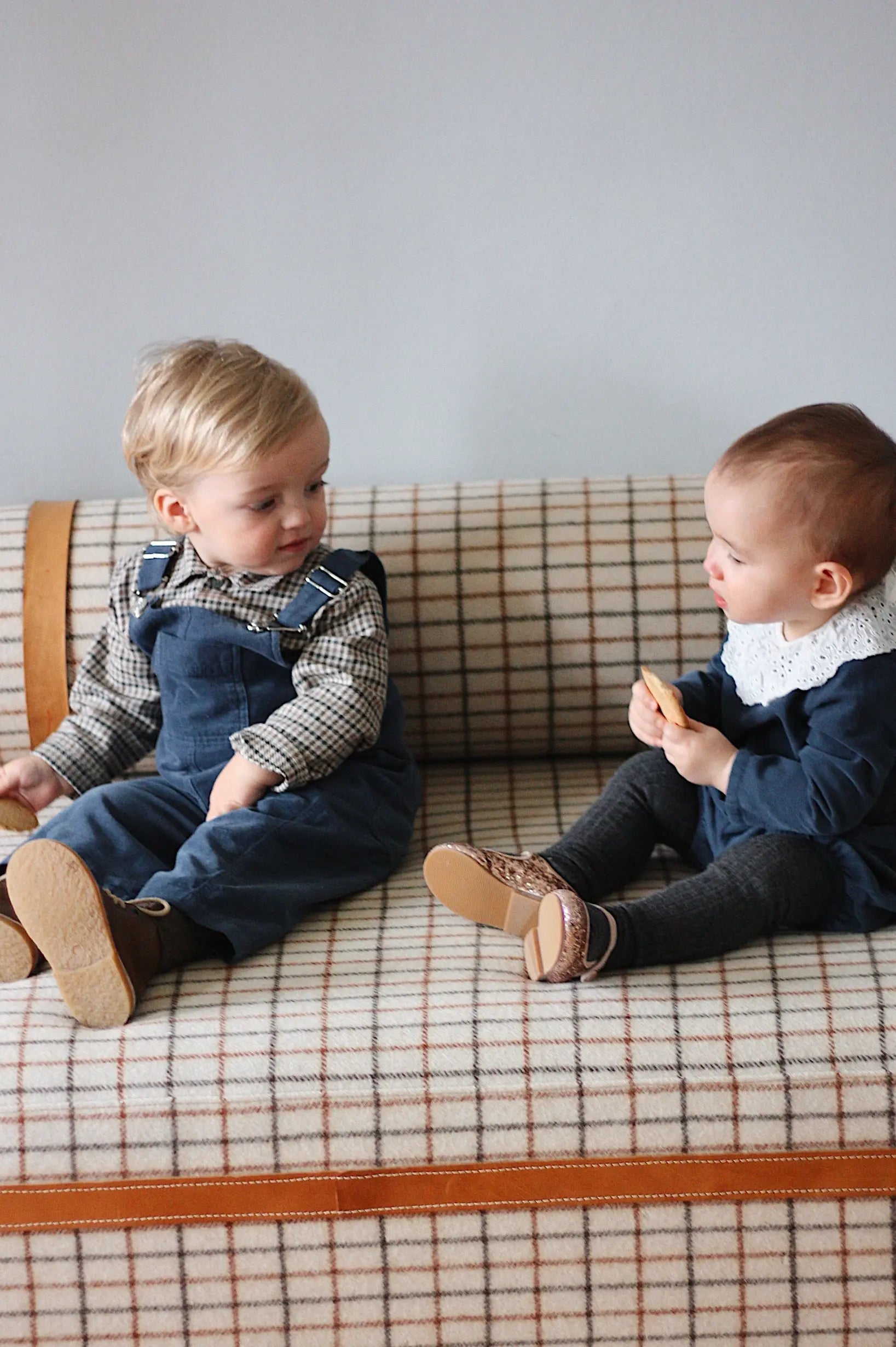 Baby girl wearing Lalaby Lucy set in whale blue cotton baby corduroy