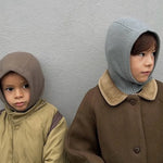 Boys wearing Lalaby Mio balaclavas for babies and kids in dove blue and toast brown cashmere