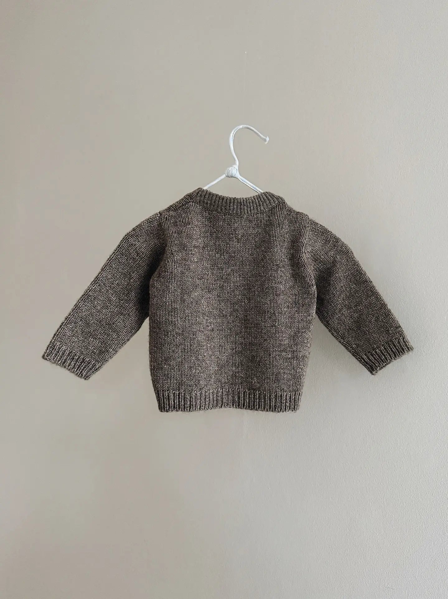 Lalaby Nomi cardigan for babies in a millet brown baby wool, yak and cashmere blend