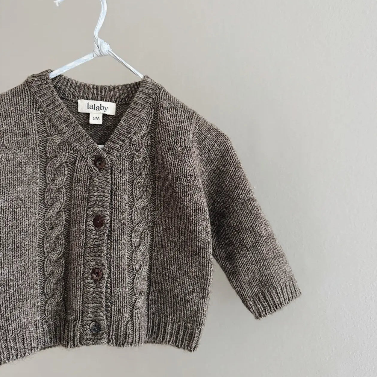 Lalaby Nomi cardigan for babies in a millet brown baby wool, yak and cashmere blend