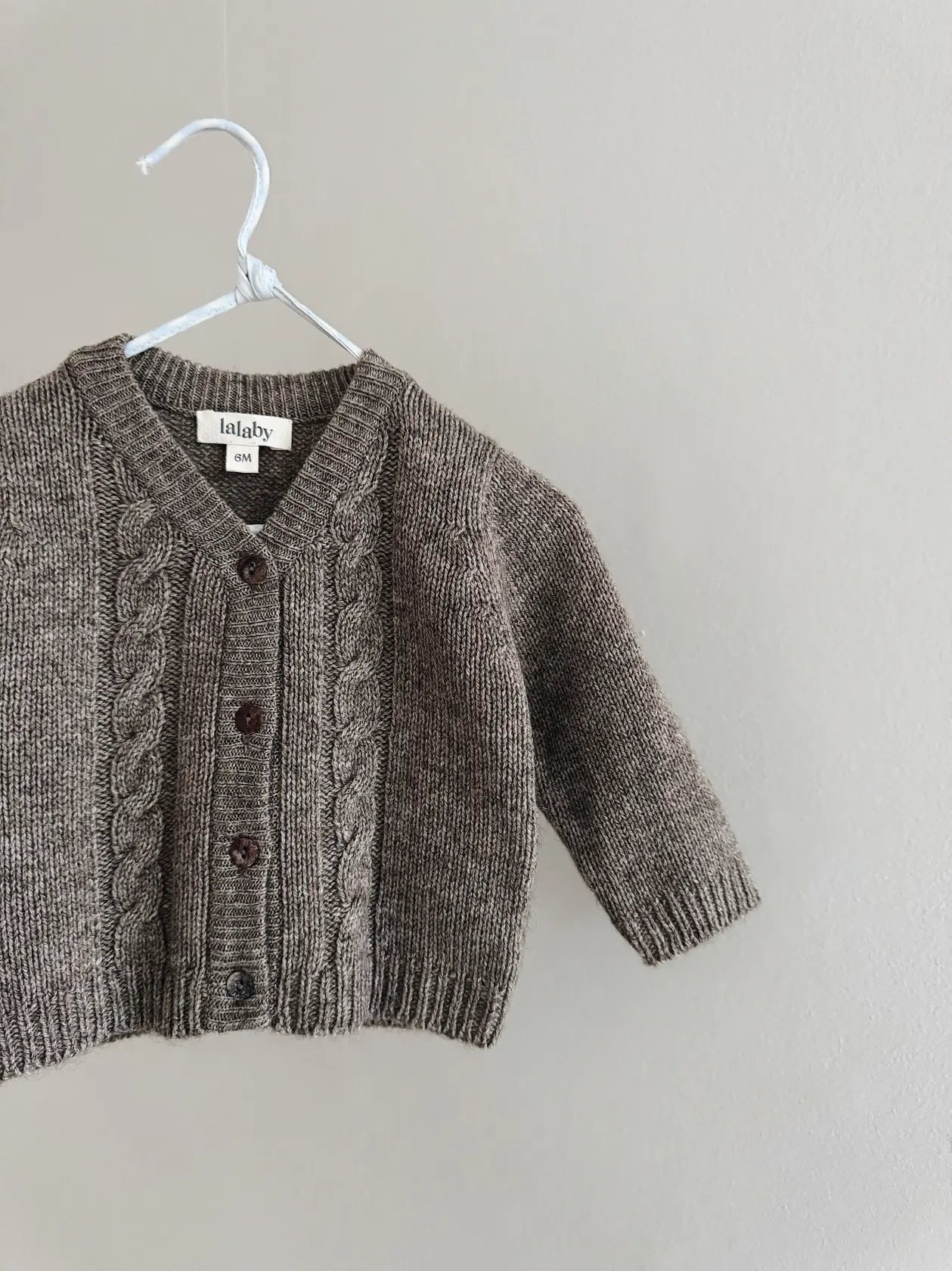 Lalaby Nomi cardigan for babies in a millet brown baby wool, yak and cashmere blend