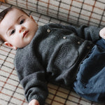 Baby boy wearing Lalaby Panda pants in whale blue cotton baby corduroy