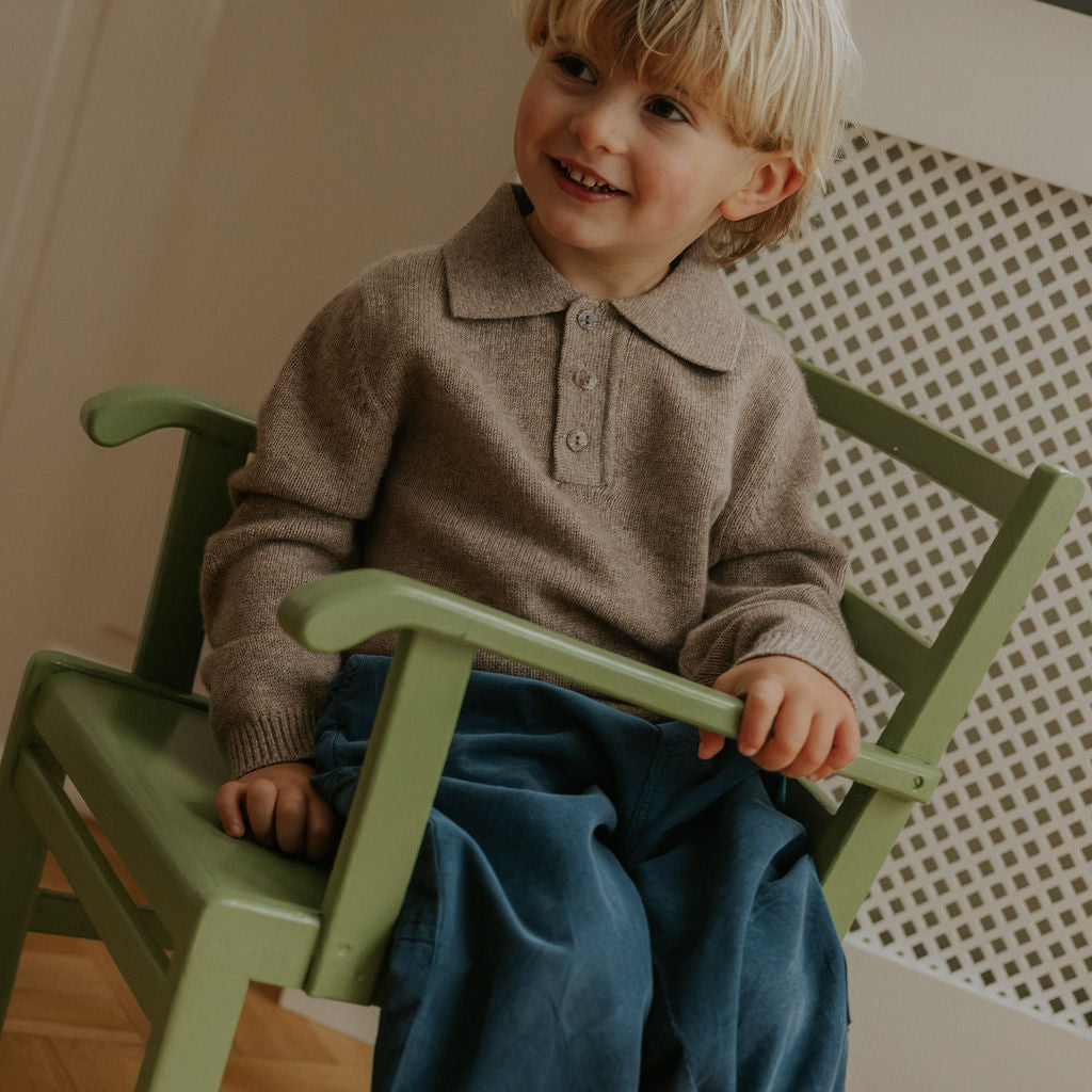 Boy wearing Lalaby Pauli polo in toast brown cashmere