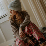 Girl wearing Lalaby Pauli polo in toast brown cashmere