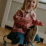 Girl wearing Lalaby Petra kids skirt in whale blue cotton baby cord