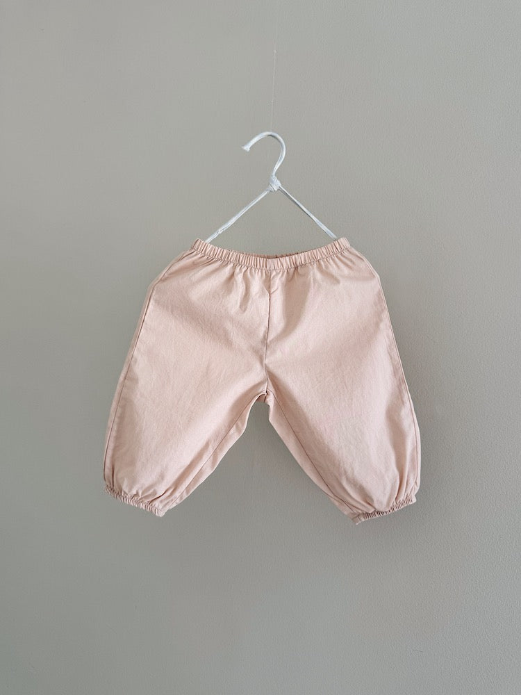 Lalaby Pixi baby trousers in soft pink blush made from organic cotton