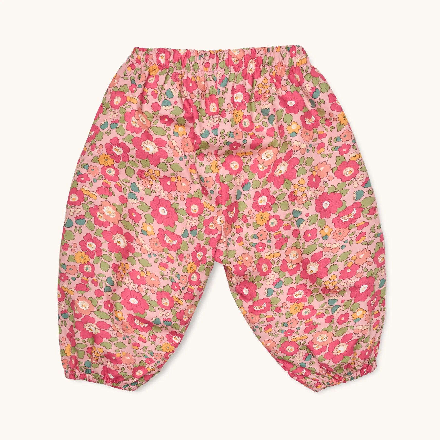 Lalaby Pixi pants for babies in berry betsy pink liberty organic cotton