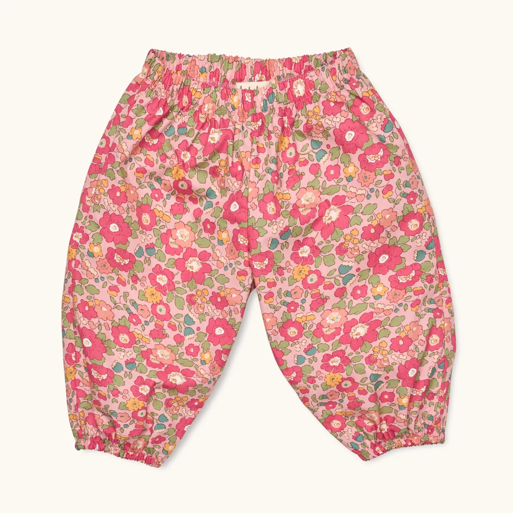 Lalaby Pixi pants for babies in berry betsy pink liberty organic cotton