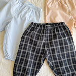 Lalaby pixi baby pants in three colorways, sky blue, blush pink and blue check